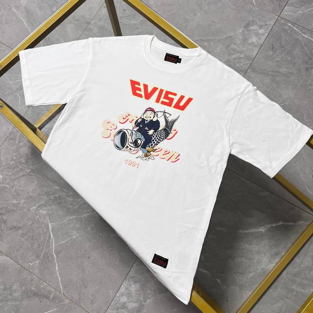 2024上新早春 Evisu 福神新款男士佛头及鲤鱼印花圆领宽松休闲情侣短袖T恤 码数S-XXL - 点击图像关闭